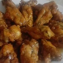 A picture of Chicken wings with caramel sauce.