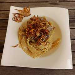 Foto di Reginette con guanciale e carciofi in crema d'uovo e Castelmagno