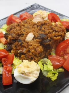 Una foto de Migas con huevos rellenos