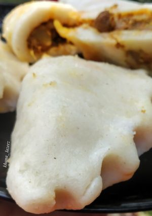 A picture of STEAMED RICE FLOUR PITHA with CHICKEN MINCE.