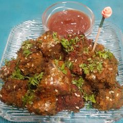 A picture of Patra Dhokla Bytes With Meethi Chutney.