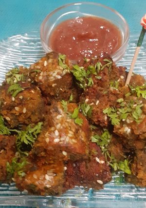A picture of Patra Dhokla Bytes With Meethi Chutney.