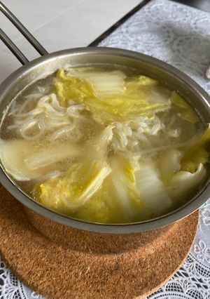 A picture of Asian noodle chicken soup.