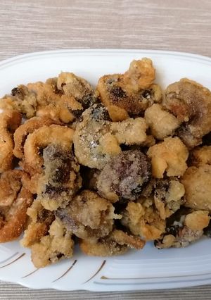 Foto di Funghi champignon impanati e fritti