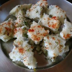 Dhokla on tawa or in kadai A picture of Dhokla on tawa or in kadai.