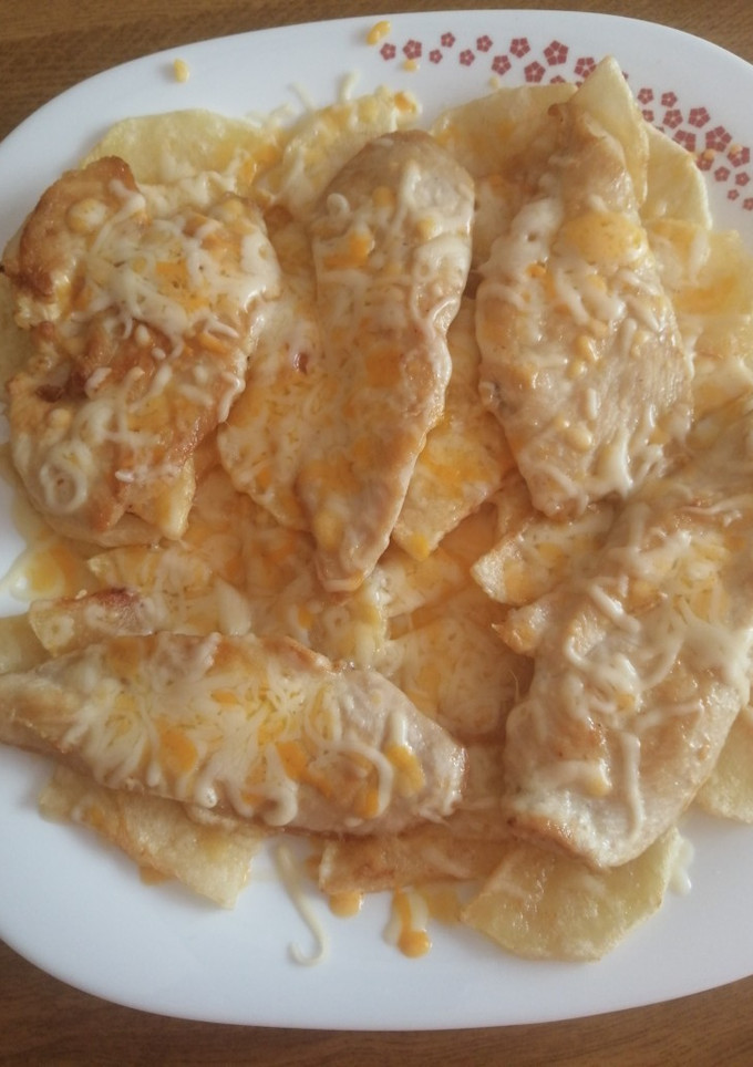 Una foto de Pechuga sobre nido de patatas