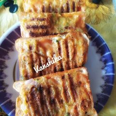 A picture of Open masala Toast.