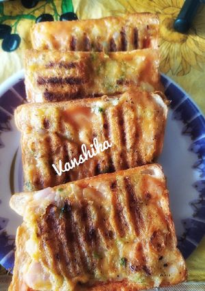 A picture of Open masala Toast.