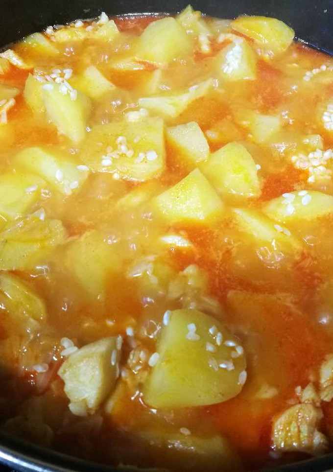 Una foto de Patatas con bacalao y arroz