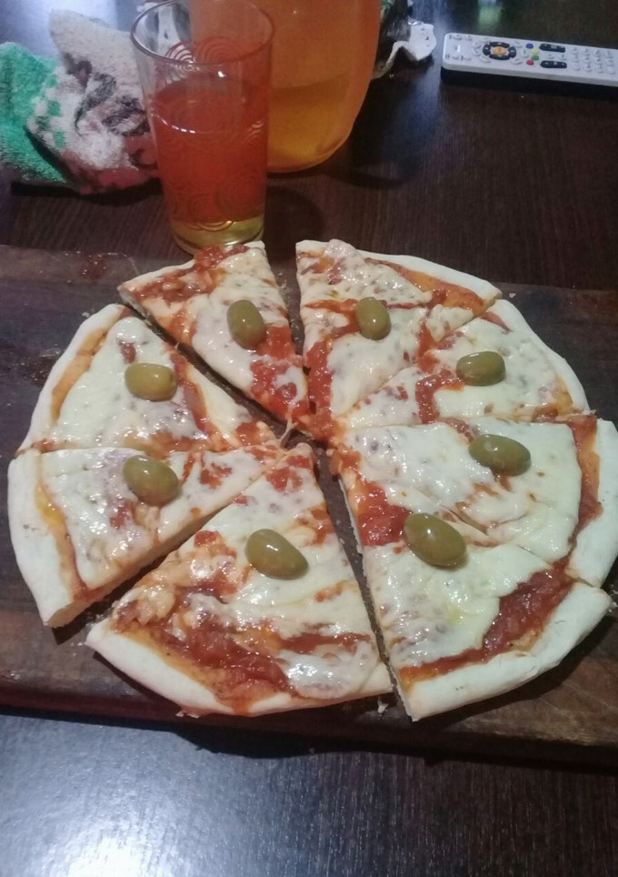 Una foto de Pizza caserita.. Súper fácil