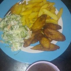 A picture of Fried irish,plantain and salad.