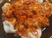 Una foto de cappelletti de pollo y verdura