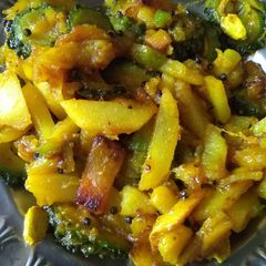 A picture of Bitter gourd potato pumpkin stir fry.