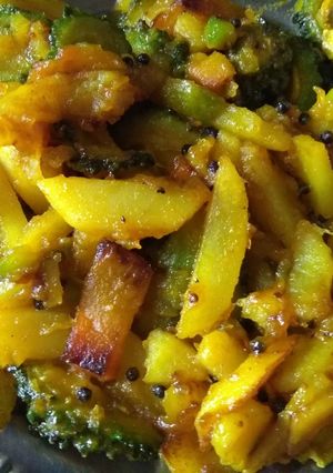 A picture of Bitter gourd potato pumpkin stir fry.