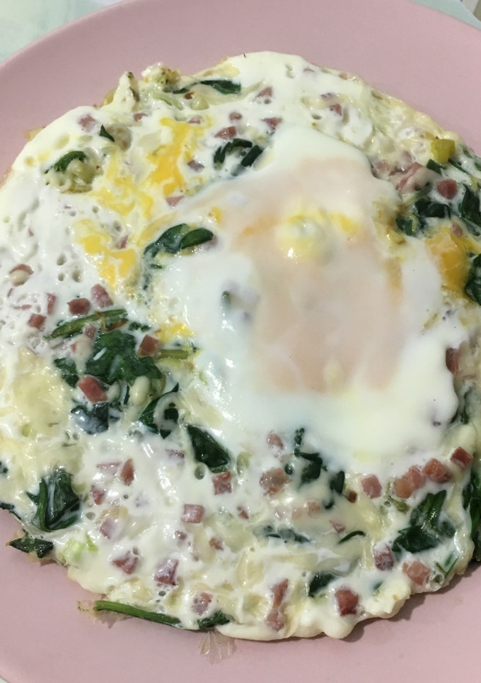 Una foto de Tortipizza de espinacas y jamón