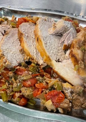 Une photo de Carré de porc mariné au miel et tomates