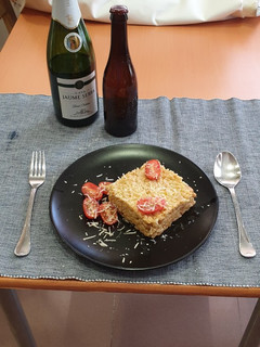 Una foto de Risotto de merluza y gambas con champán