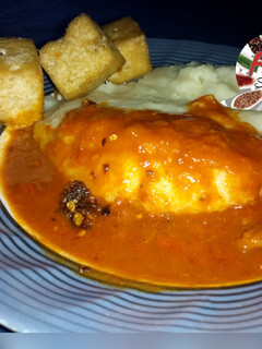 A picture of Semolina wv Yoruba peppered stew.