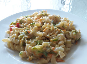 Una foto de Salsa de zuchinni y zanahoria con queso crema