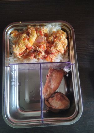 A picture of Rice and egg sauce.
