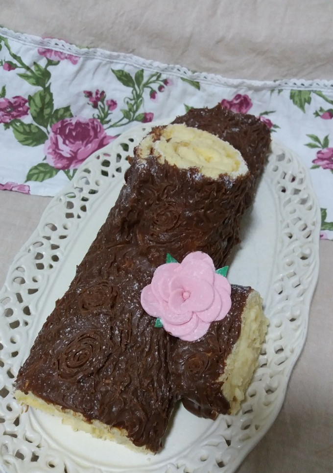 Una foto de Tronco relleno de crema pastelera