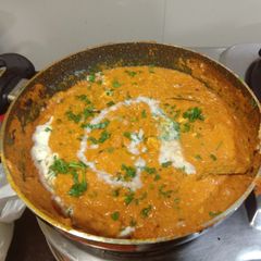 A picture of Veg chilli milli with cashew nut tomato gravy.