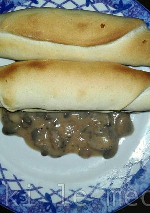 Una foto de Chaparritas con salsa de champiñones