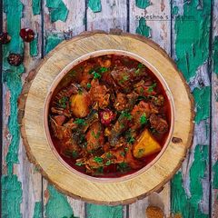 A picture of Kadaknath Chicken Curry.