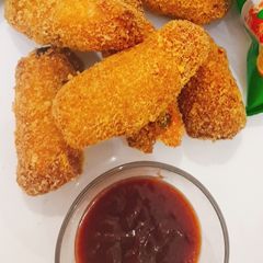 A picture of Bread Rolls with Kurkure.