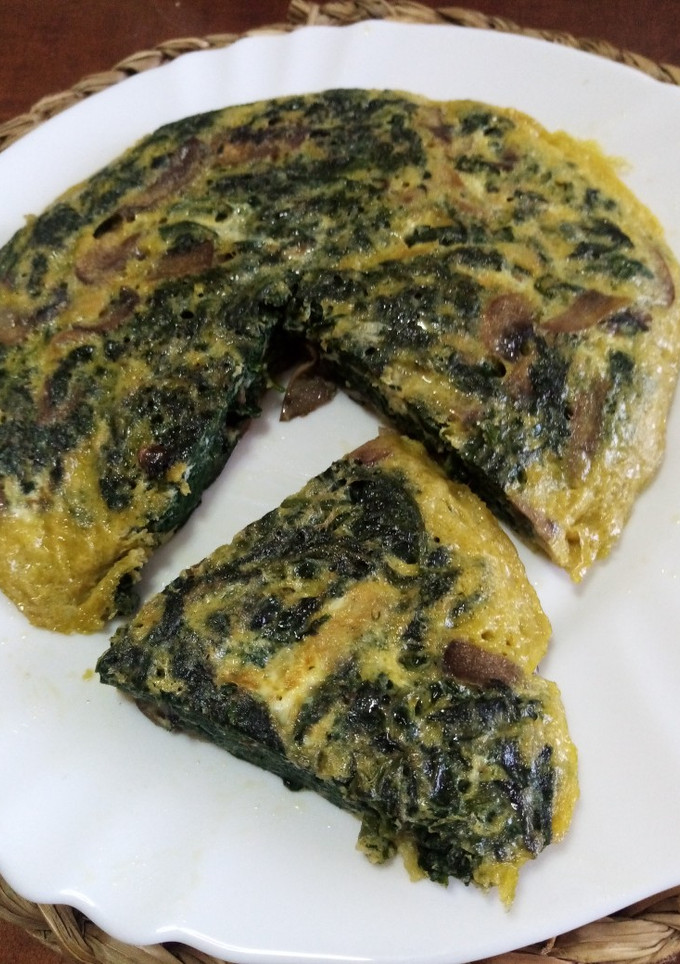 Una foto de Tortilla de espinacas y champiñón
