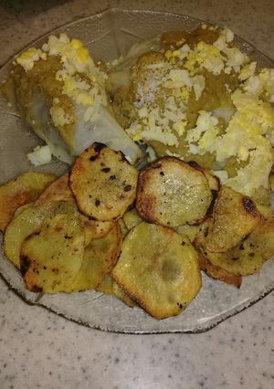 Una foto de Paquetitos con salsa verde y lengüitas de papa