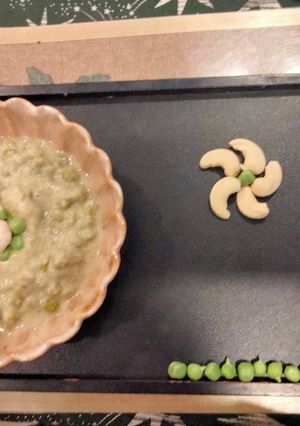 A picture of Peas and makhana curry in white gravy.