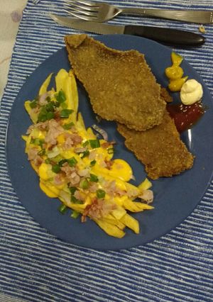 Una foto de Bacon al microondas Ej: Papas fritas con cheddar y bacon/panceta