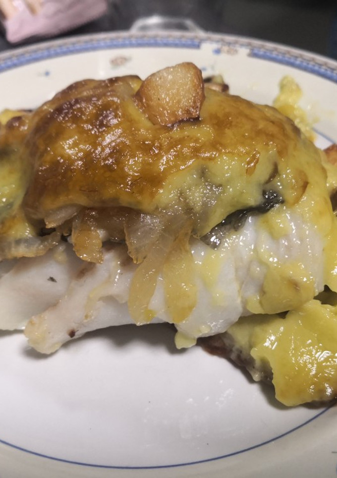 Una foto de Bacalao skrei con gratinado de pil pil