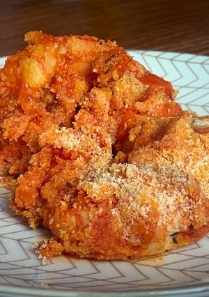 Una foto de Langostinos con tomate y jengibre