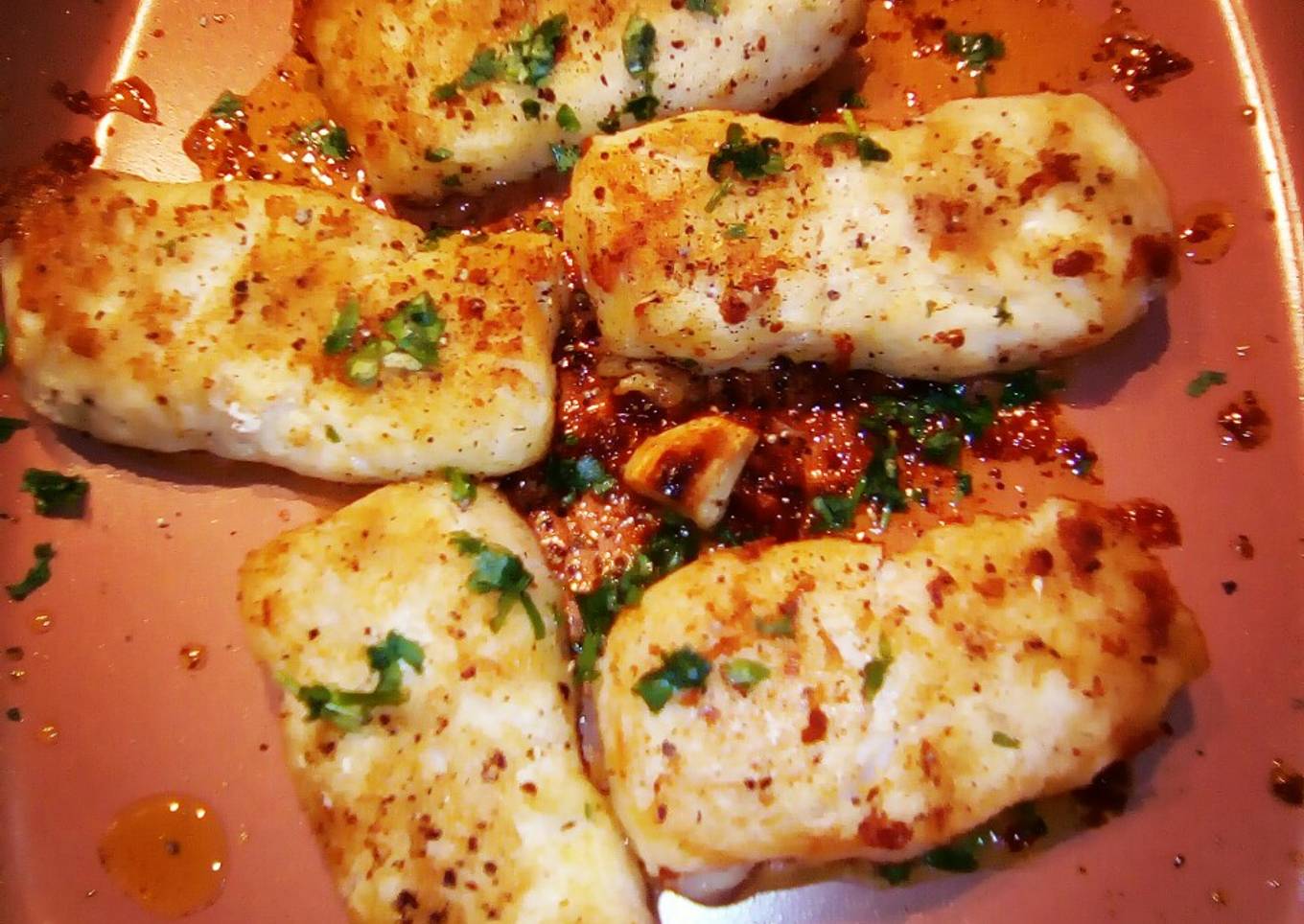 Garlic buttered Prime Hake medallions