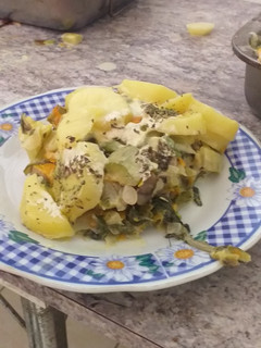 Una foto de Papas gratinadas con acelga