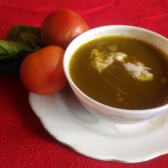 A picture of Tomato spinach soup.