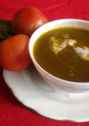 A picture of Tomato spinach soup.