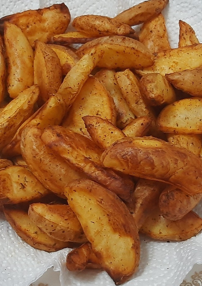 Una foto de Patatas gajos (Hechas en freidora de aire SOGO)