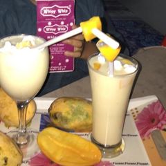 A picture of #fiveingredients. Mango shake with cream.
