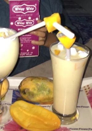 A picture of #fiveingredients. Mango shake with cream.