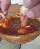 Piernas de pollo en salsa de piña con tres chiles y jalapeño rojos