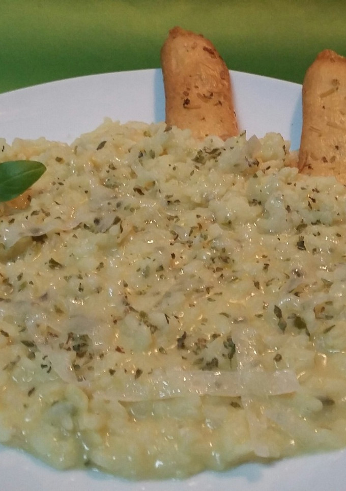 Una foto de Rissotto con parmesano