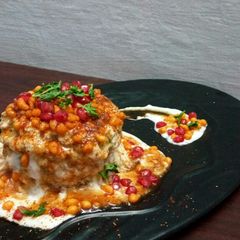 A picture of Baked Dahi-Bhalla Cake.