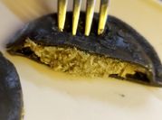 Una foto de pasta con tinta calamar