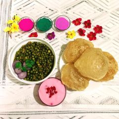 A picture of Luchi / Puri and Ghugni.