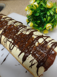 Una foto de Budín de coco y dulce de leche súper fácil