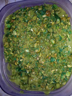 A picture of Avocado pudding with wossabi peas.