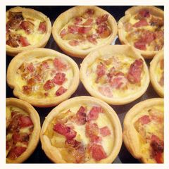 A picture of Caramelized onion & bacon mini quiche.